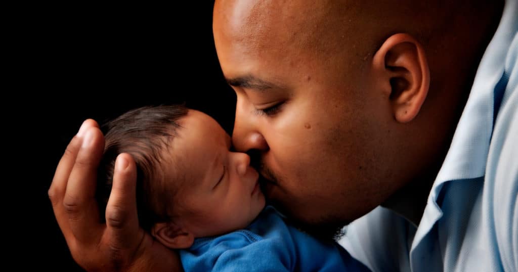Father bonding with baby