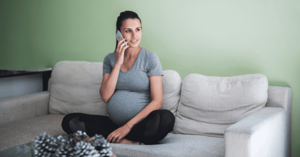 Pregnant Woman on a phone call, when should I call my doula?