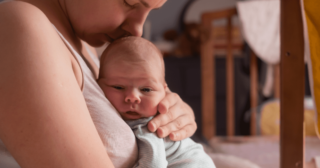 Breastfeeding Red Flags, Mom holding newborn baby