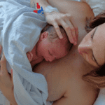 Baby on Mom's chest during the Golden Hour After Birth