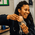 Breastfeeding Class Instructor showing how to use a haakaa breast pump