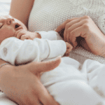 Mom holding baby, parenting challenges, do I hate being a parent?