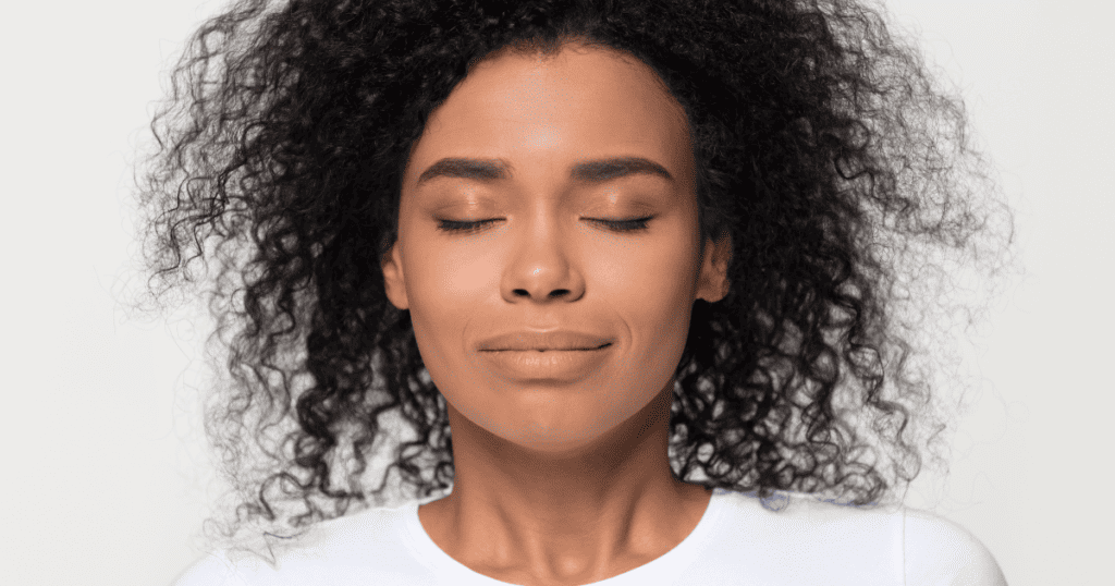 breathing techniques for labor, woman taking a breath