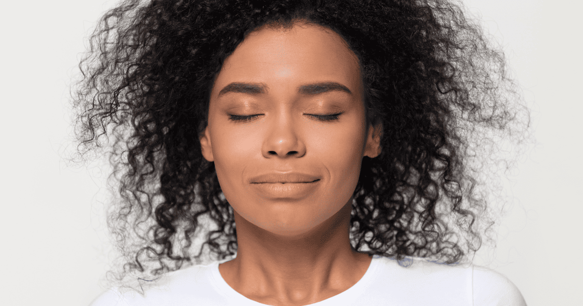 breathing techniques for labor, woman taking a breath
