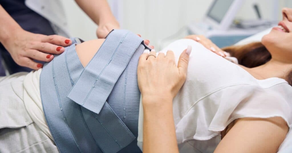 Pregnant Mom with monitors on her belly, non-stress test