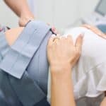 Pregnant Mom with monitors on her belly, non-stress test