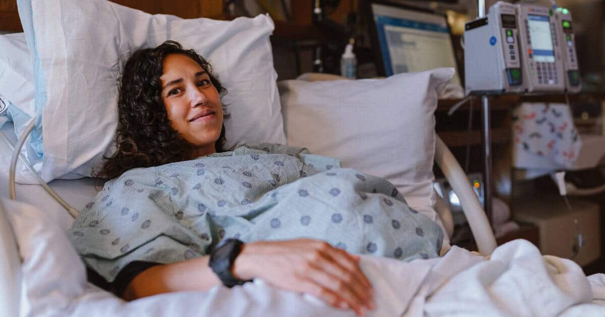 woman in hospital bed being induced for labor