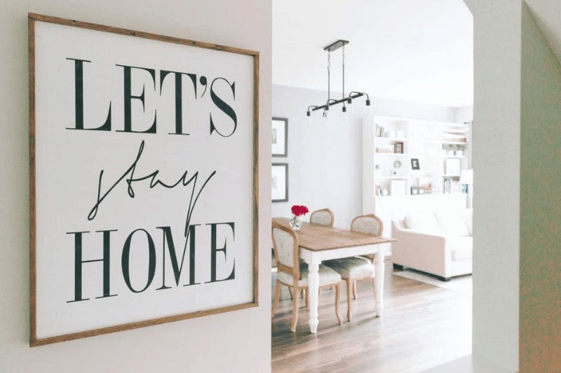 Home space with 'let's stay home' sign