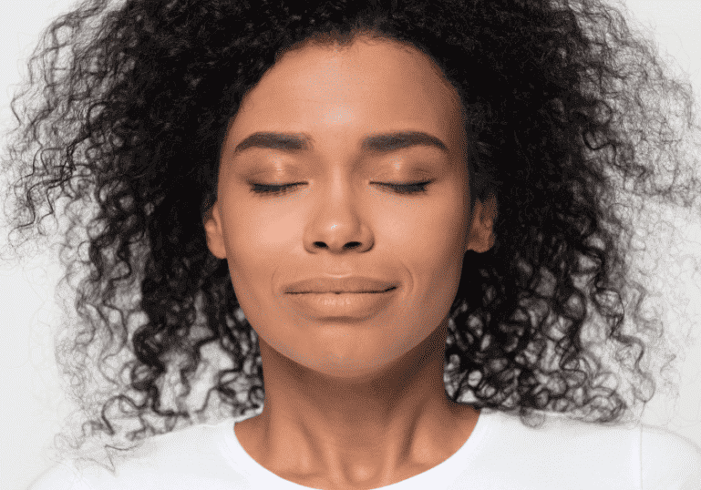 breathing techniques for labor, woman taking a breath