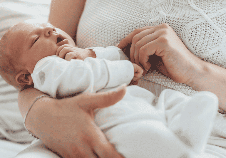 Mom holding baby, parenting challenges, do I hate being a parent?