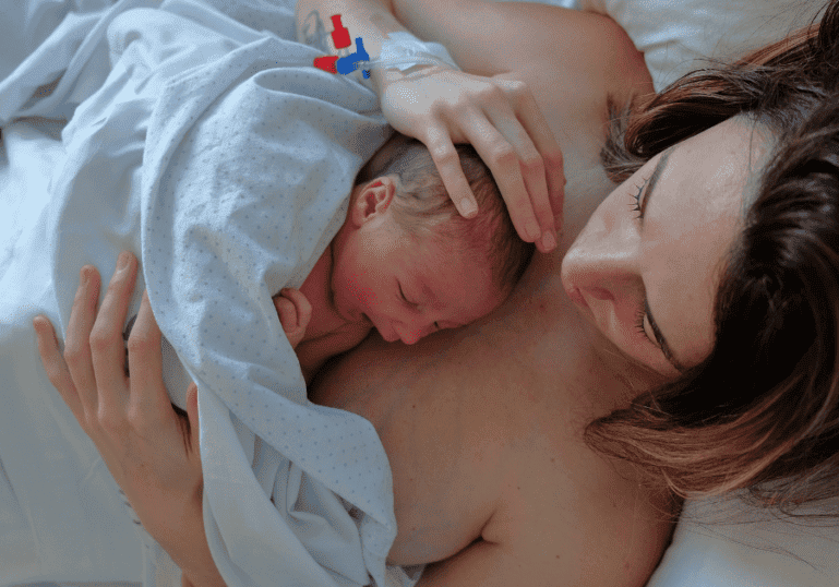 Baby on Mom's chest during the Golden Hour After Birth