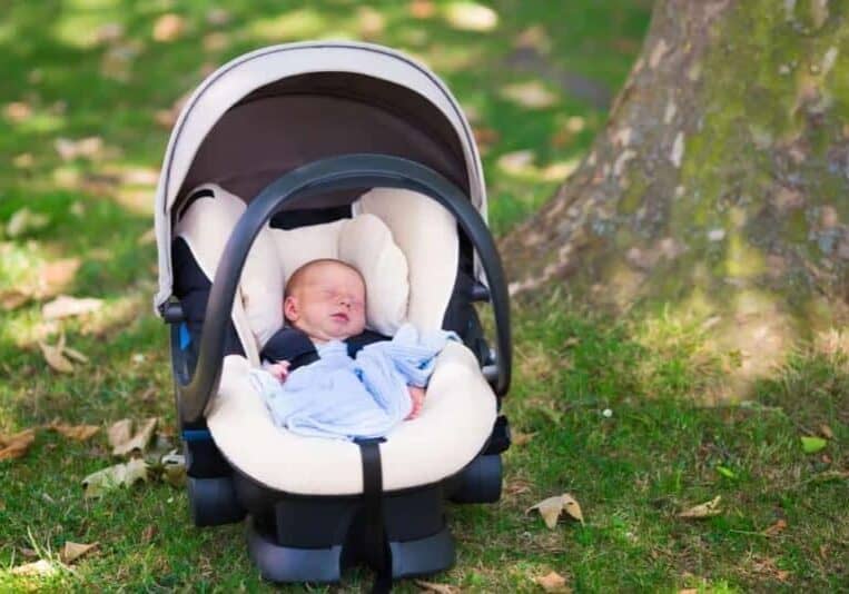 infant in car seat outside